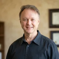Dr. Chris Nicol